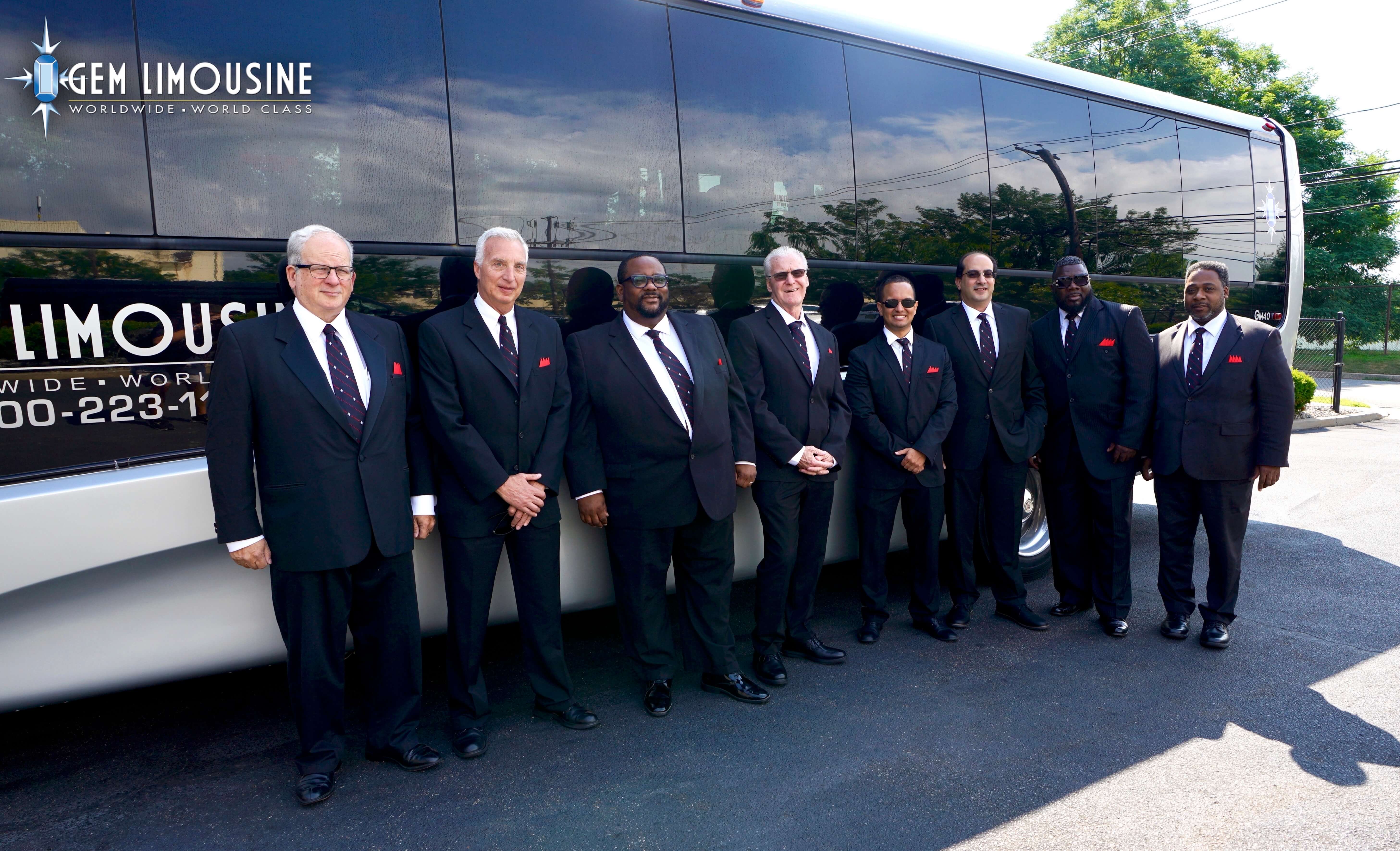 Image 7: Professional chauffeur opening door for corporate executive — premium ground transportation since 1976