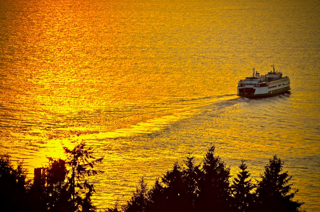 Washington State Ferry on Puget Sound with water and shoreline in the background
